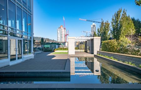 Stunning 2 Bed | 2 Bath Corner Unit at Marquee at Lougheed - Photo 2