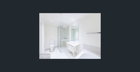 Modern 3 Bedroom Townhouse In Sought After Location - Photo 4