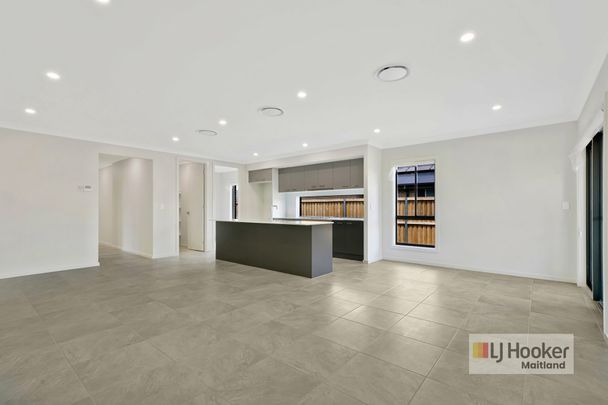 Brand New 4-Bedroom Family Home - Photo 1