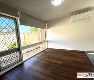 Neat & Convenient Living in a Great Location! - Photo 2