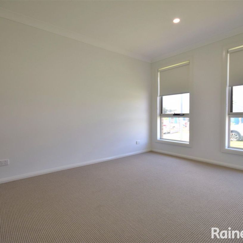 Stylish 4-Bedroom Home Designed for Comfort & Convenience - Photo 1