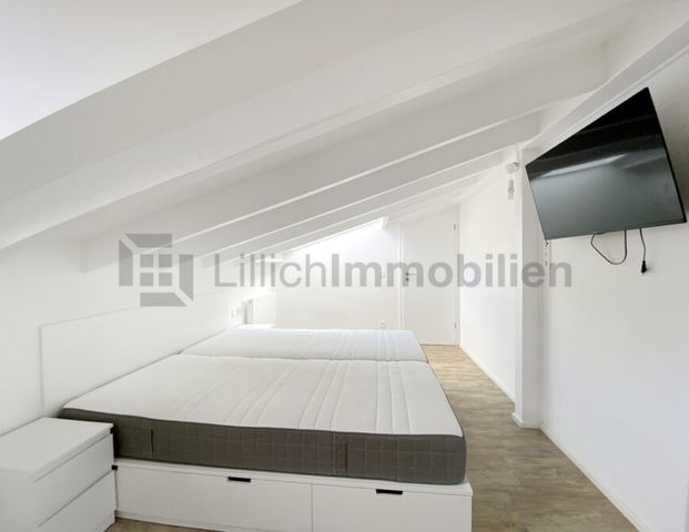 Moderne 2-Zimmer-Wohnung mit EBK und Dachterrasse in Top-Lage! - Foto 1