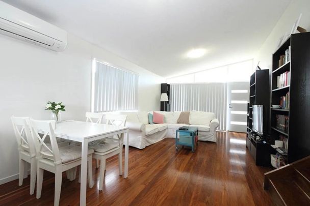 Charming Home with High Ceilings and Modern Comfort - Photo 1