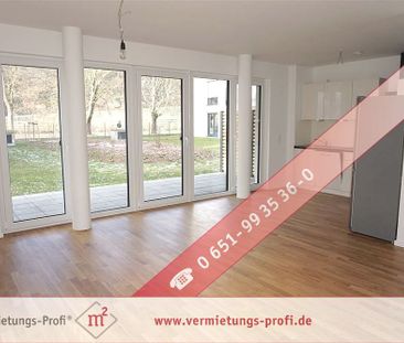 Moderne Erdgeschosswohnung mit Einbauküche und Terrasse! Mit direkt... - Foto 1