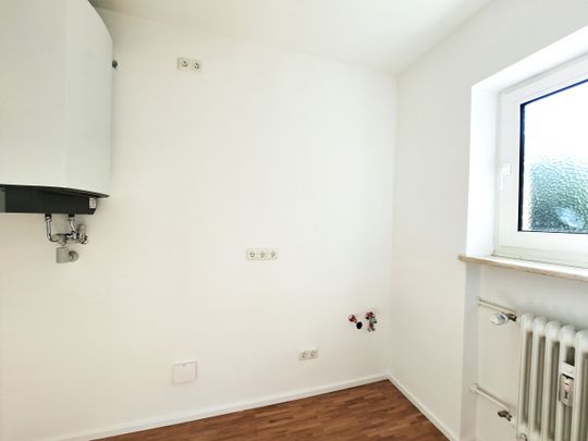 Charmante 2-Zimmer-Wohnung mit Westbalkon in Allach! - Foto 1