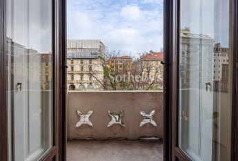 Spacious renovated apartment with balconies in a historic building