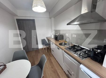 Apartament cu 2 camere, decomandat, cartier Damila - Photo 3
