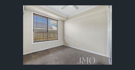 Comfortable Family Home with Multiple Living Areas & Pool - Photo 5