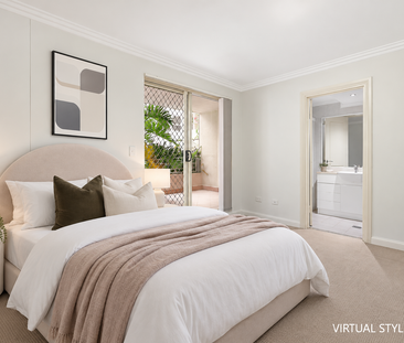 Modern, Secure Two Bedroom Oasis Nested at Rear of Block - Photo 2