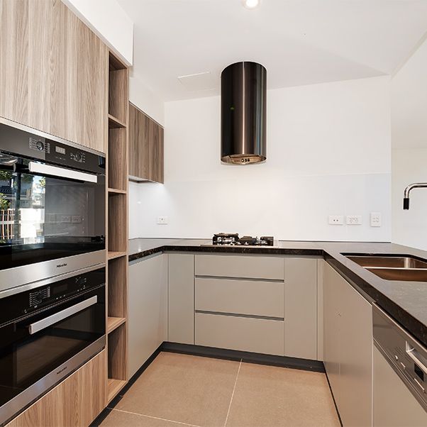 Split Level Two Bedroom Apartment With Parking - Photo 1