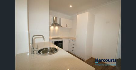 Welcome to this modern 2-bedroom, 2-bathroom apartment located in a secure, gated complex - Photo 4