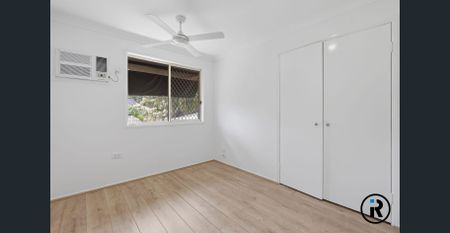 Freshly Updated Dual Living Home with Pool in Prime Carrara Location - Photo 5