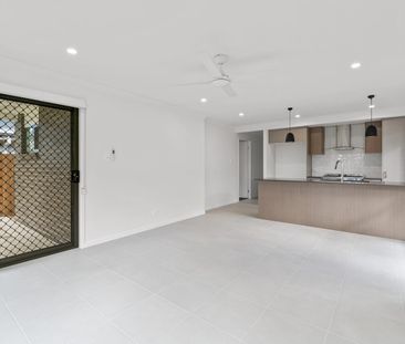 Stunning Family Home in Logan Reserve - Photo 1