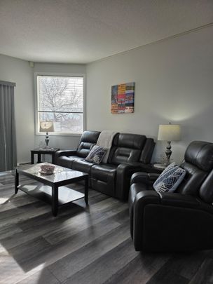 All-Inclusive! Bring your suitcase and settle into your fully furnished, executive style condo. - Photo 1