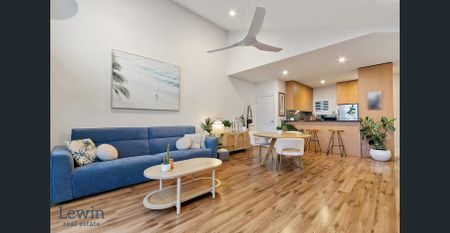 Spacious, Sun-Filled Living in a Prime Bayside Location - Photo 2