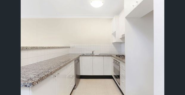 Resort Style Living Huge 2 BD Apartment with Tennis Court, Pool & Water Views - Photo 1