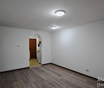 Two Bedroom Unit in an Ideal Location - Photo 1