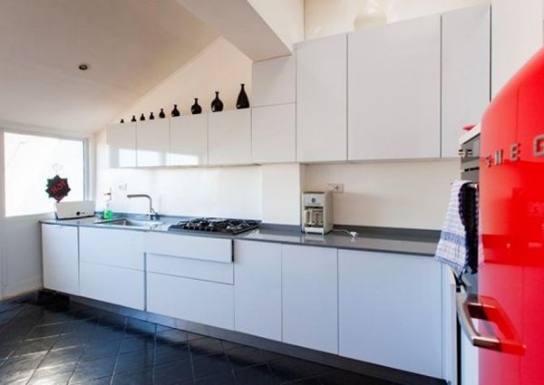 Attic-Monti: Spacious, furnished 3 Bedroom, 2 bath, living room, dining room, study and large panoramic terrace. Bright, silent, located in well kept Palazzo d’Epoca with elevator and doorman. Near transport and Metro.