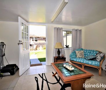 Neat and Inviting Home with Enclosed Carport - Photo 2