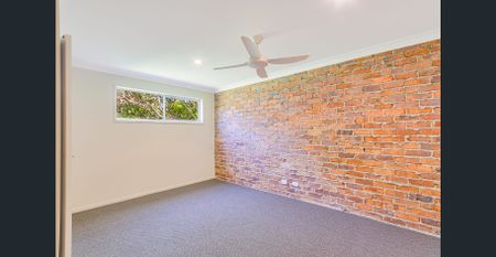 Spacious 3-Bedroom Top Floor Unit with Ocean Views & Character Features - Photo 3