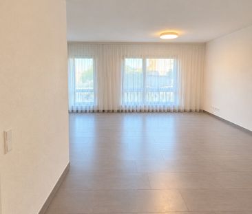 Attraktive 3.5-Zimmer-Wohnung mit Terrasse, Hallenbad & Garage in G... - Photo 1