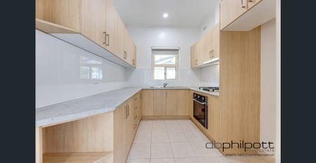 Bright, Spacious & Ready to Call Home in Brooklyn Park! - Photo 2