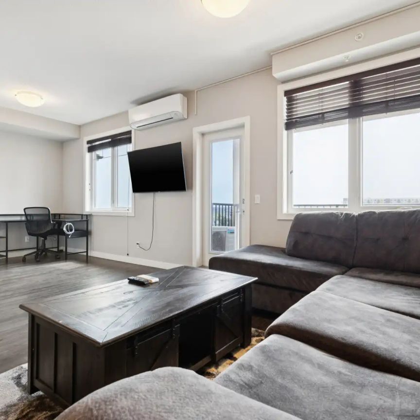 Essence at Windermere South Furnished Suite — 1 bedroom - Photo 1