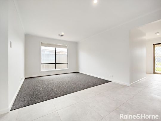 Brand new home - make it yours! - Photo 1