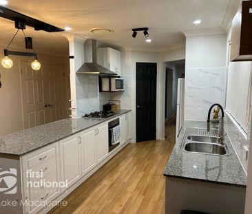 Charming and Spacious 4-Bedroom Home - Photo 3