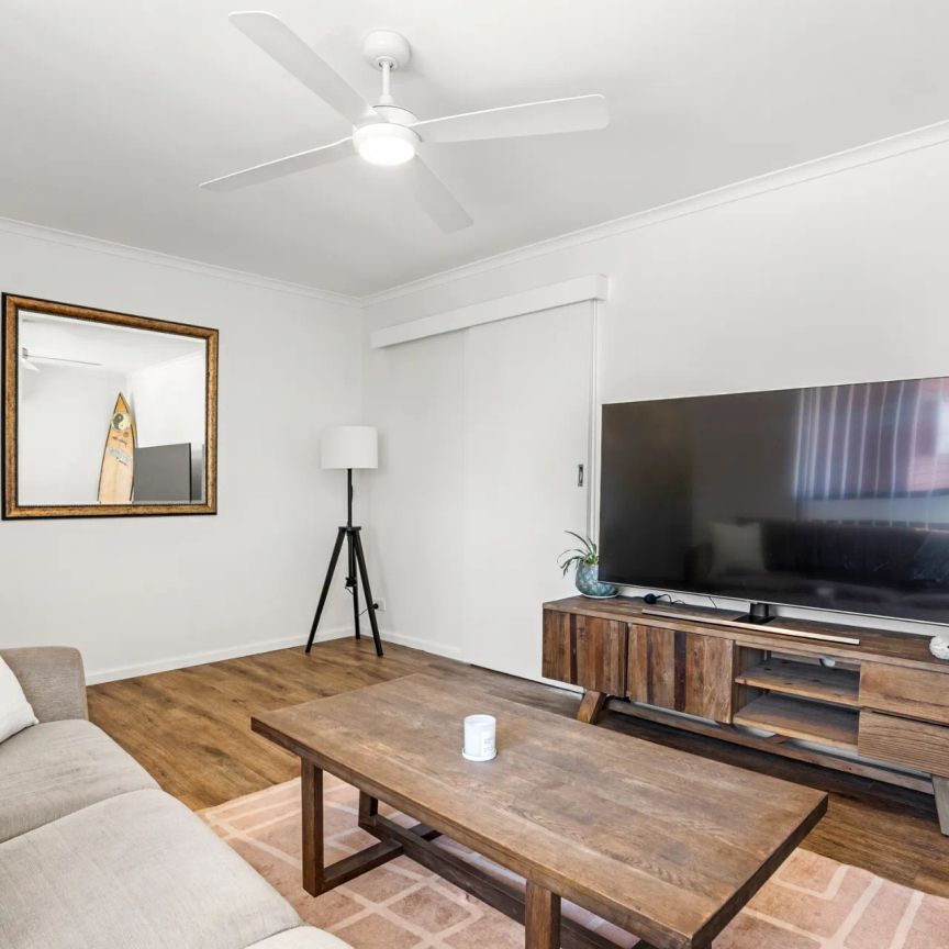 Neat and tidy beachside home on a large block. - Photo 1