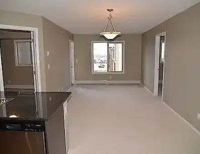 LAKEVIEW @ SADDLERIDGE 2BEDROOM/2BATH/DEN/HEATED PARKING | Calgary - Photo 1