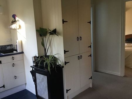 Charming 2BR Home with Garden Oasis - Photo 3