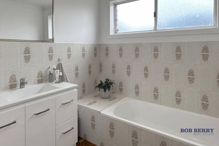 Two-Bedroom Duplex with Pool - Prime Location Near Orana Mall - Photo 2
