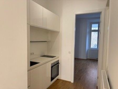 Sehr schöne, moderne 2-Zimmer-Wohnung saniert, gute Ausstattung mit Klimaanlage, Schlafzimmer in den Innenhof mit Balkon, Wohnzimmer und Küche in Graz-super zentral-UNIHÄHE - Photo 5