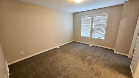 Three Level Townhome With Double Garage In Auburn Bay | Lake Access. - Photo 2