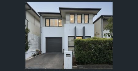 Charming two-storey home with modern amenities and versatile living space - Photo 5