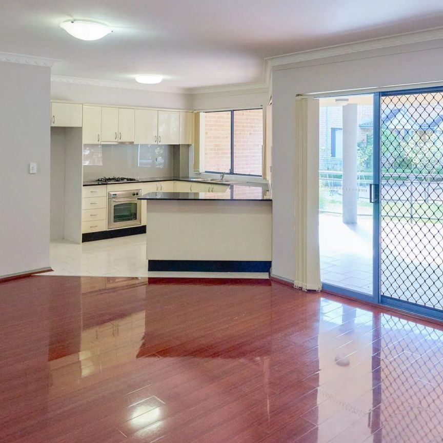 Oversized Two Bedroom Unit in Highly Convenient Locale - Photo 1
