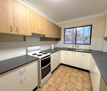 Large 2 Bedroom Unit - Great Location - Photo 1