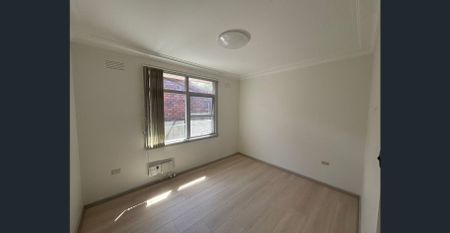 Solid Brick Home with Sunlit Interiors in a Convenient Location - Photo 2