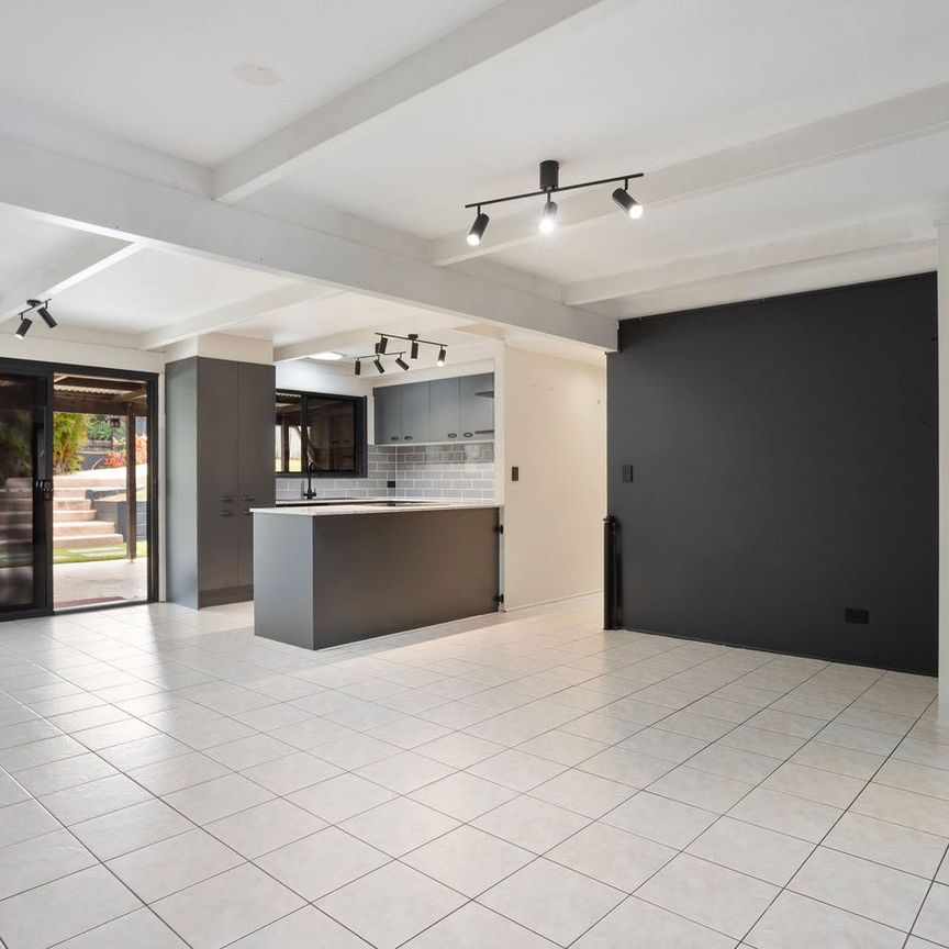 Summer Ready – Family Home with Sparkling Pool - Photo 1