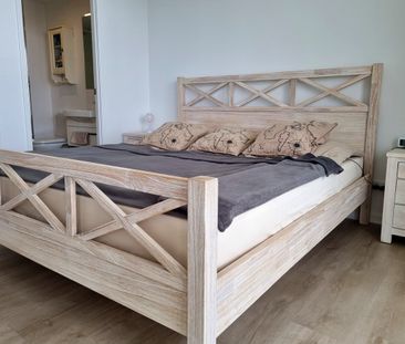 Unfurnished Luxury Living with Broadwater Views - Photo 2