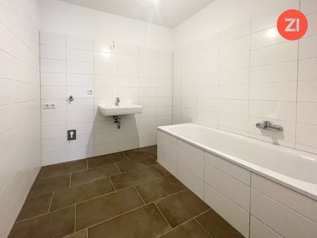 Zuhause am Inn – Geförderte 3 ZI-Wohnungen mit Balkon & Tiefgaragenparkplatz - Photo 4