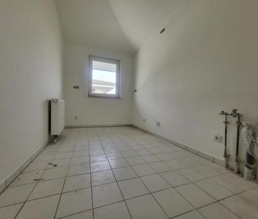 Sonnige Dachgeschosswohnung mit Eckbalkon in Französisch Buchholz - Photo 1