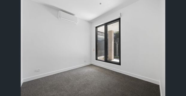 Stylish & Low-Maintenance Living in a Prime Location - Photo 1