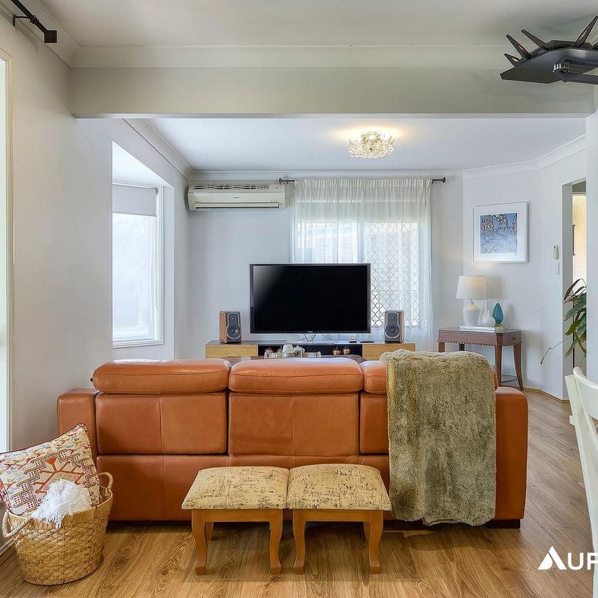 A Welcoming Home in a Peaceful Stafford Heights Setting - Photo 1