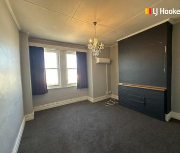 Tidy flat on Atkinson! - Photo 1