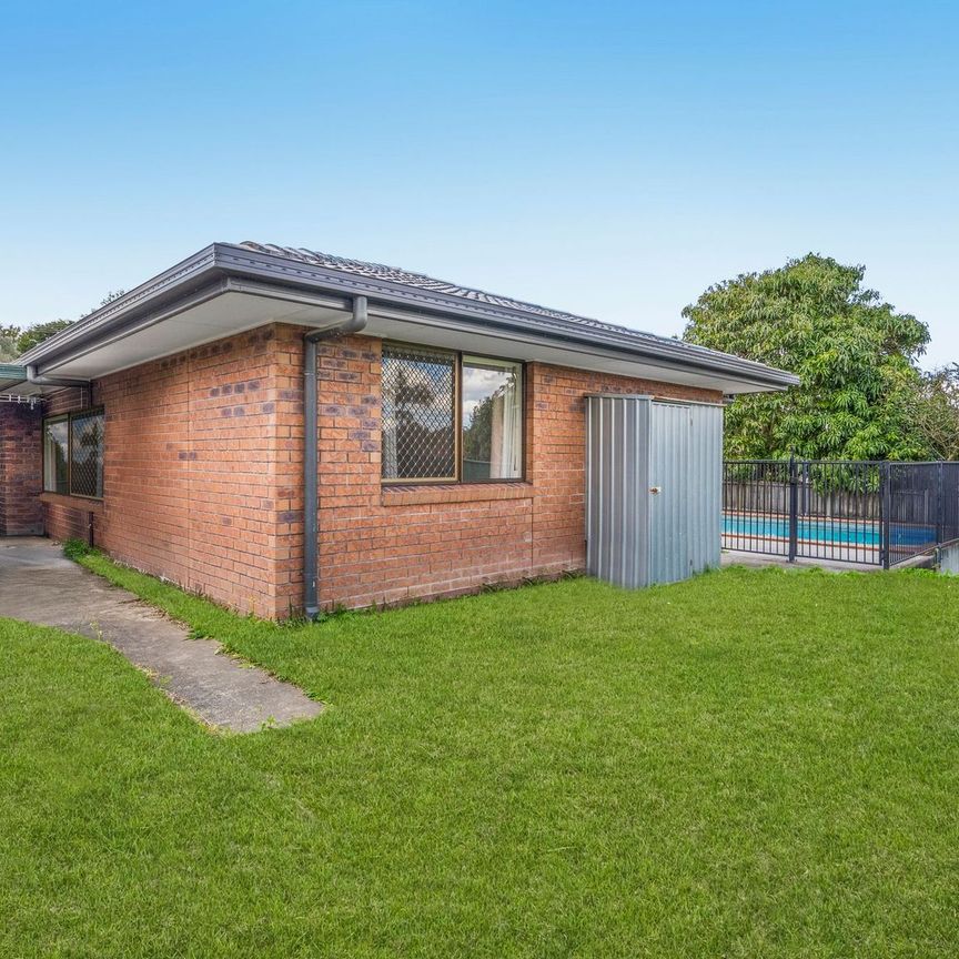 Lovely Contemporary Home with Sparkling Pool and Solar - Photo 1