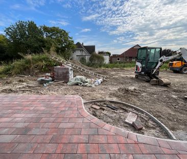 Neubauwohnung im Erdgeschoss mit großer Garage und Garten - Foto 6