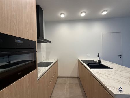 Energiezuinige nieuwbouwappartement met garagebox en gemeenschappelijk zwembad - Photo 2