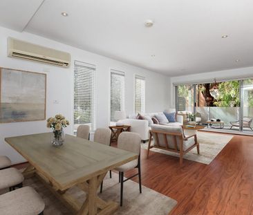 Two Floors, Two Carports, Too Good to Miss! - Photo 2